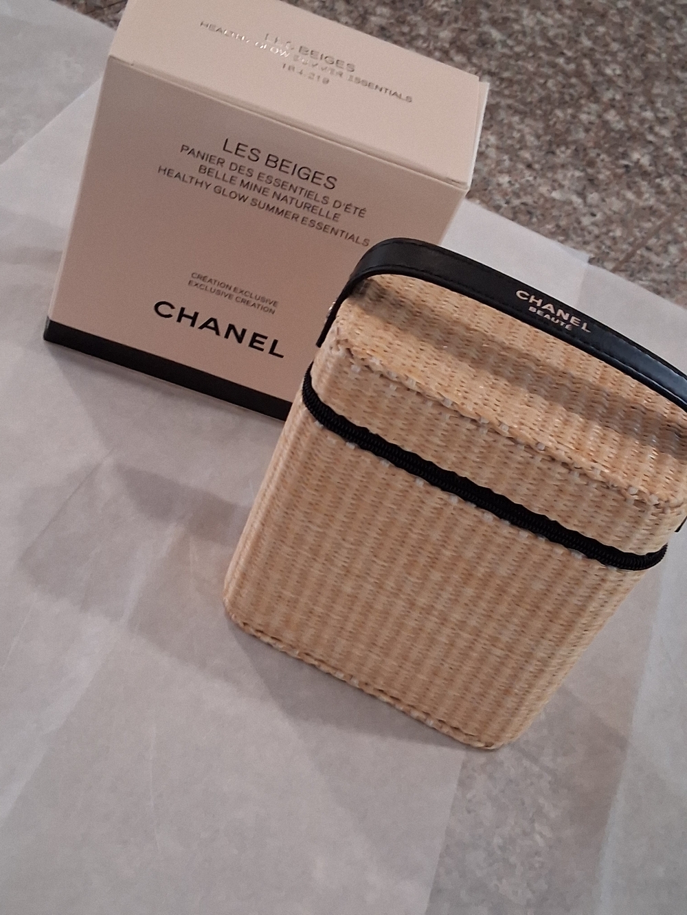 CHANEL Beige Woven Mini Bag with Black Trim